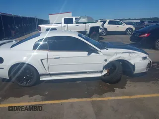 2004 Ford Mustang Standard z VIN 1FAFP40654F229283, wystawiony jako IAAI lot #42309648 z przebiegiem 164 610 mil mil oraz . Historia ofert i sprzedaży dostępna na DreamBid. Obrazek 14.