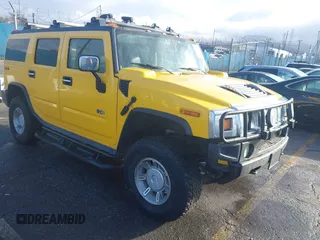 2003 Hummer H2 with VIN 5GRGN23UX3H119348, listed as a IAAI auction lot 41461786 with 185,701 mi miles. Bid and sale history available at carsss.com. Image 1.