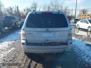 2010 Mercury Mariner with VIN 4M2CN8B72AKJ30465, listed as a IAAI auction lot 41554592 with 110,973 mi miles. Bid and sale history available at carsss.com. Image 17.