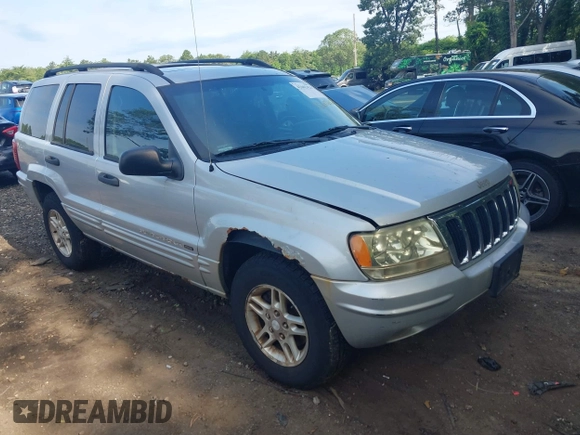 2002 Jeep Grand Cherokee Laredo z VIN 1J4GW48S62C261154, wystawiony jako IAAI lot #42602424 z przebiegiem 160 295 mil mil oraz . Historia ofert i sprzedaży dostępna na DreamBid. Obrazek 1.