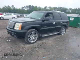 2003 Cadillac Escalade z VIN 1GYEK63N13R140496, wystawiony jako IAAI lot #42366303 z przebiegiem 90 940 mil mil oraz . Historia ofert i sprzedaży dostępna na DreamBid. Obrazek 2.