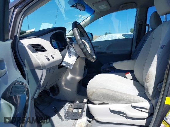 2012 Toyota Sienna with VIN 5TDZK3DC9CS261944, listed as a IAAI auction lot 41885359 with 184,918 mi miles. Bid and sale history available at carsss.com. Image 5.