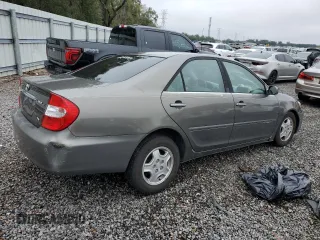 2003 Toyota Camry LE z VIN 4T1BF32K43U546140, wystawiony jako Copart lot #54493785 z przebiegiem 165 264 mil mil oraz Nie do naprawy • Non repairable. Historia ofert i sprzedaży dostępna na DreamBid. Obrazek 3.