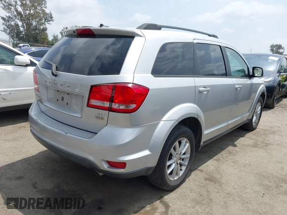 2013 Dodge Journey SXT with VIN 3C4PDCBG9DT506384, listed as a IAAI auction lot 42119685 with 143,769 mi miles. Bid and sale history available at carsss.com. Image 4.