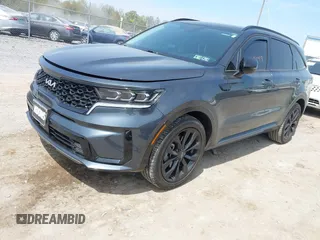 2023 Kia Sorento SX z VIN 5XYRK4LF0PG171635, wystawiony jako IAAI lot #42116649 z przebiegiem 75 348 mil mil oraz . Historia ofert i sprzedaży dostępna na DreamBid. Obrazek 2.