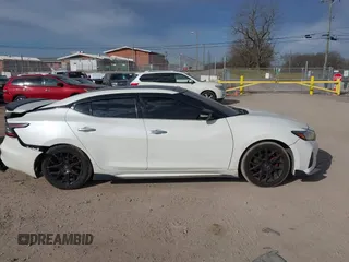 2019 Nissan Maxima SV with VIN 1N4AA6AV7KC383974, listed as a IAAI auction lot 41660286 with 86,682 mi miles and . Bid and sale history available at DreamBid. Image 13.