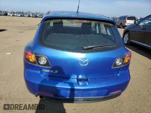 2006 Mazda 3 S Grand Touring with VIN JM1BK343861434940, listed as a Copart auction lot 63624024 with 56,737 mi miles and Salvage Title. Bid and sale history available at DreamBid. Image 6.