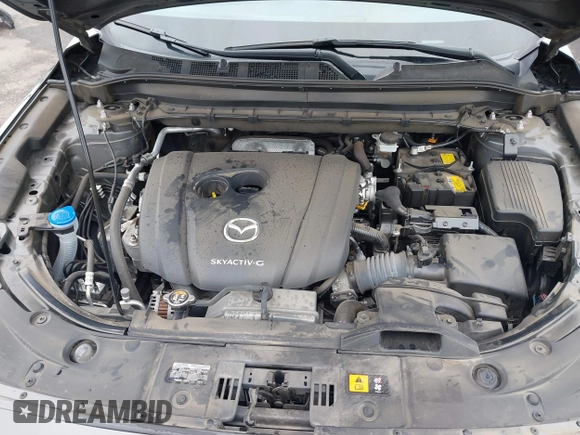 2020 Mazda CX-5 Grand Touring with VIN JM3KFBDM4L0829861, listed as a IAAI auction lot 41826250 with 62,091 mi miles and . Bid and sale history available at carsss.com. Image 10.