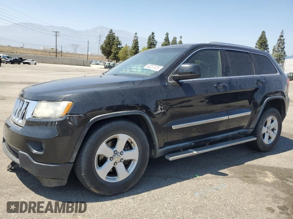 2011 Jeep Grand Cherokee Laredo with VIN 1J4RR4GG0BC563603, listed as a Copart auction lot 60237475 with 243,885 mi miles and Salvage title. Bid and sale history available at DreamBid. Image 1.
