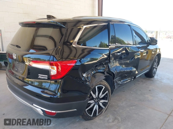 2021 Honda Pilot Touring 8-Passenger z VIN 5FNYF6H99MB049728, wystawiony jako IAAI lot #42194602 z przebiegiem 41 374 mil mil oraz . Historia ofert i sprzedaży dostępna na DreamBid. Obrazek 4.