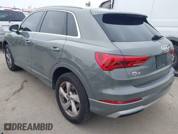 2020 Audi Q3 Premium with VIN WA1AECF32L1061271, listed as a IAAI auction lot 42038795 with 23,902 mi miles and . Bid and sale history available at DreamBid. Image 3.