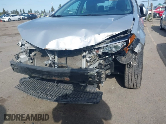 2019 Toyota Corolla L with VIN 2T1BURHE2KC190975, listed as a IAAI auction lot 41901370 with 94,925 mi miles. Bid and sale history available at carsss.com. Image 6.