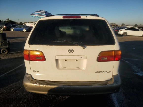 2000 Toyota Sienna LE with VIN 4T3ZF13CXYU184839, listed as a Copart auction lot 80035434 with 0 mi miles and Salvage Title. Bid and sale history available at carsss.com. Image 6.