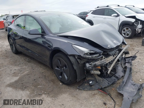 2022 Tesla Model 3 Long Range z VIN 5YJ3E1EB8NF315359, wystawiony jako IAAI lot #42035599 z przebiegiem 54 974 mil mil oraz . Historia ofert i sprzedaży dostępna na DreamBid. Obrazek 1.
