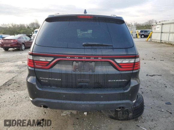 2014 Dodge Durango Citadel z VIN 1C4RDJEG8EC598108, wystawiony jako Copart lot #52485325 z przebiegiem 137 179 mil mil oraz Szkoda całkowita • Salvage title. Historia ofert i sprzedaży dostępna na DreamBid. Obrazek 6.
