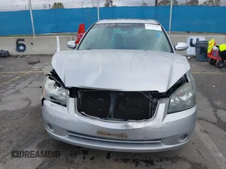 2006 Nissan Altima 2.5 with VIN 1N4AL11D66N366825, listed as a IAAI auction lot 41735284 with 169,131 mi miles. Bid and sale history available at carsss.com. Image 13.