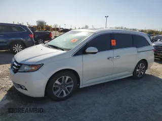 2016 Honda Odyssey Touring Elite with VIN 5FNRL5H91GB006982, listed as a Copart auction lot 52242465 with 125,873 mi miles and Salvage title. Bid and sale history available at DreamBid. Image 1.