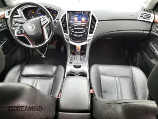 2015 Cadillac SRX Performance Collection with VIN 3GYFNFE36FS549358, listed as a Copart auction lot 59724065 with 132,045 mi miles and Salvage title. Bid and sale history available at DreamBid. Image 8.