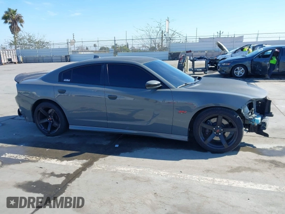 2019 Dodge Charger Scat Pack with VIN 2C3CDXGJ4KH576394, listed as a IAAI auction lot 41846702 with 70,209 mi miles and . Bid and sale history available at DreamBid. Image 13.