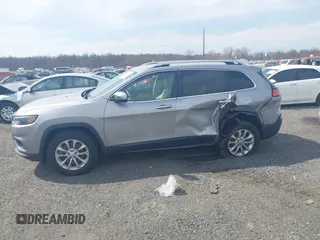 2019 Jeep Cherokee Latitude with VIN 1C4PJMCB4KD239465, listed as a IAAI auction lot 41849483 with 81,229 mi miles. Bid and sale history available at carsss.com. Image 14.