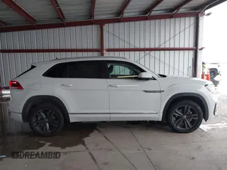 2021 Volkswagen Atlas SE z VIN 1V2NE2CA4MC201281, wystawiony jako IAAI lot #41242760 z przebiegiem 95 209 mil mil oraz . Historia ofert i sprzedaży dostępna na DreamBid. Obrazek 14.