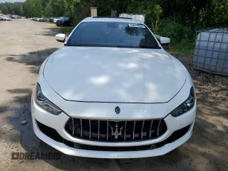 2018 Maserati Ghibli с VIN ZAM57XSA3J1296624, выставлен на аукционе Copart как лот 60810835 с пробегом 62 582 миль миль и Чистый • Clean title. История ставок и продаж доступна на DreamBid. Изображение 5.