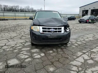 2011 Ford Escape XLS z VIN 1FMCU9C77BKC43662, wystawiony jako Copart lot #51779335 z przebiegiem 104 548 mil mil oraz Szkoda całkowita • Salvage title. Historia ofert i sprzedaży dostępna na DreamBid. Obrazek 12.