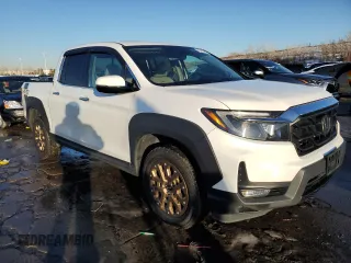 2021 Honda Ridgeline RTL-E with VIN 5FPYK3F74MB019684, listed as a Copart auction lot 42140235 with 31,223 mi miles and Salvage title. Bid and sale history available at DreamBid. Image 4.