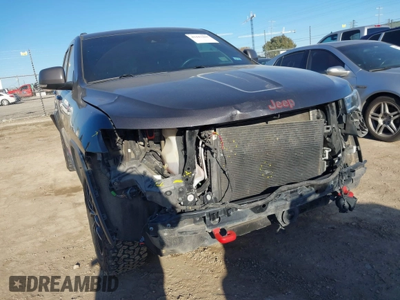 2018 Jeep Grand Cherokee Trailhawk with VIN 1C4RJFLT9JC244212, listed as a IAAI auction lot 41443469 with 77,953 mi miles and . Bid and sale history available at DreamBid. Image 6.