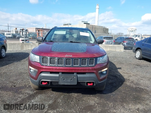 2020 Jeep Compass Trailhawk with VIN 3C4NJDDB2LT239384, listed as a IAAI auction lot 41527372 with 56,122 mi miles and . Bid and sale history available at carsss.com. Image 12.