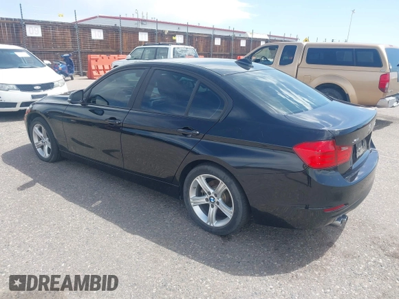2014 BMW 3 Series 328i xDrive with VIN WBA3B3C56EJ981322, listed as a IAAI auction lot 42104530 with 104,376 mi miles. Bid and sale history available at carsss.com. Image 3.