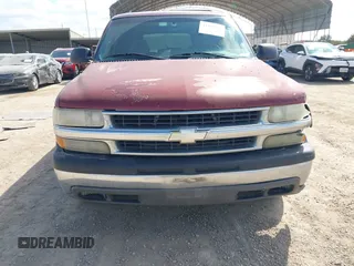 2003 Chevrolet Suburban LT with VIN 1GNEC16Z13J247753, listed as a IAAI auction lot 41501608 with 300,977 mi miles. Bid and sale history available at carsss.com. Image 12.