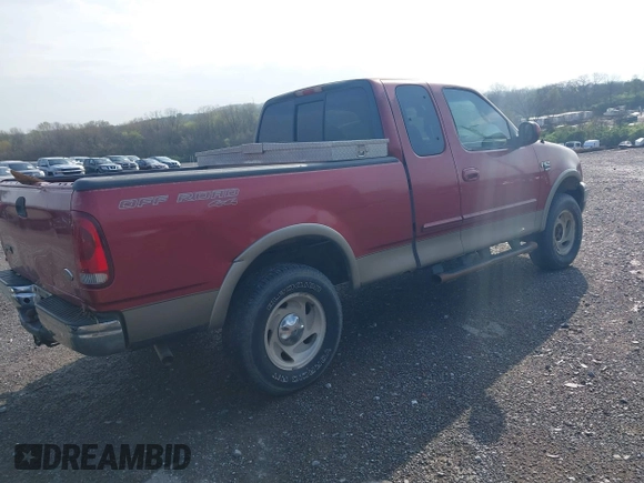 2001 Ford F-150 XL with VIN 1FTRX18L41KF38469, listed as a IAAI auction lot 41954075 with 219,967 mi miles. Bid and sale history available at carsss.com. Image 4.