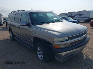 2002 Chevrolet Suburban LT z VIN 1GNEC16T42J236126, wystawiony jako IAAI lot #42287440 z przebiegiem 285 872 mil mil oraz . Historia ofert i sprzedaży dostępna na DreamBid. Obrazek 1.