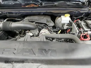 2021 Ram 1500 Big Horn z VIN 1C6RREFT7MN708516, wystawiony jako Copart lot #57719405 z przebiegiem 65 000 mil mil oraz Szkoda całkowita • Salvage title. Historia ofert i sprzedaży dostępna na DreamBid. Obrazek 11.