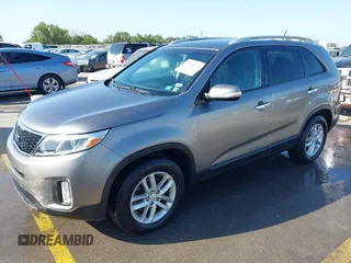 2014 Kia Sorento LX with VIN 5XYKT4A67EG528288, listed as a IAAI auction lot 42036077 with 67,835 mi miles. Bid and sale history available at carsss.com. Image 2.