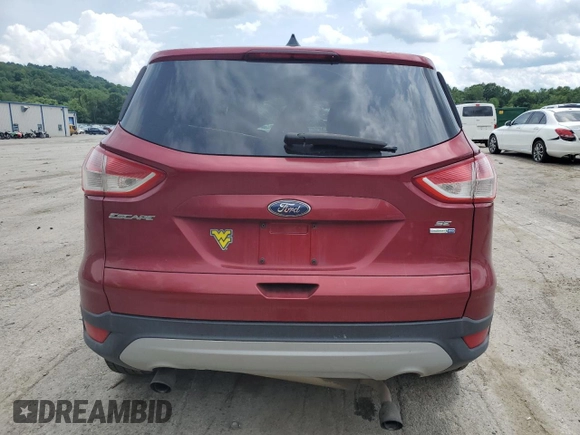 2013 Ford Escape SE с VIN 1FMCU9GX4DUD84643, выставлен на аукционе Copart как лот 61930215 с пробегом 197 193 миль миль и Списание • Salvage title. История ставок и продаж доступна на DreamBid. Изображение 6.