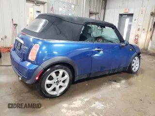 2007 MINI Convertible with VIN WMWRF33507TG16448, listed as a Copart auction lot 88474495 with 148,147 mi miles and Salvage Title. Bid and sale history available at DreamBid. Image 3.
