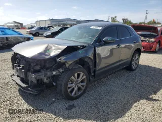 2021 Mazda CX-30 Select z VIN 3MVDMABL8MM220412, wystawiony jako Copart lot #54248825 z przebiegiem 78 325 mil mil oraz Szkoda całkowita • Salvage title. Historia ofert i sprzedaży dostępna na DreamBid. Obrazek 1.