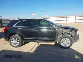 2018 Cadillac XT5 FWD with VIN 1GYKNARS3JZ104087, listed as a IAAI auction lot 41586765 with 137,369 mi miles. Bid and sale history available at carsss.com. Image 14.