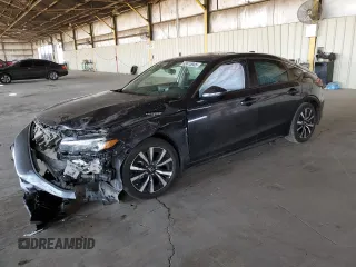 2023 Honda Civic EX-L with VIN 19XFL1H7XPE004261, listed as a Copart auction lot 62413935 with 46,543 mi miles and Salvage title. Bid and sale history available at DreamBid. Image 1.