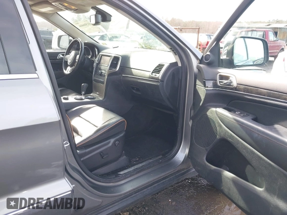 2013 Jeep Grand Cherokee Overland with VIN 1C4RJFCG8DC581719, listed as a IAAI auction lot 41566666 with 152,332 mi miles. Bid and sale history available at carsss.com. Image 5.