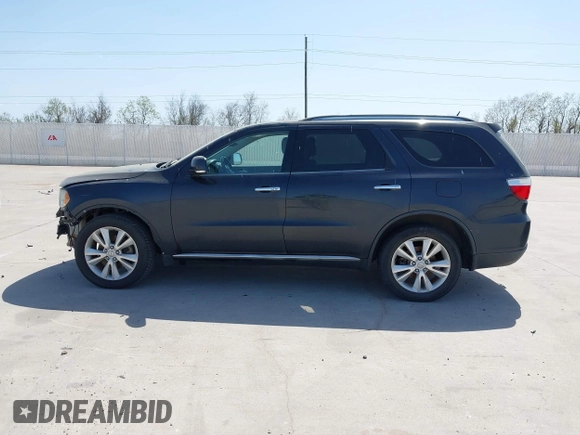 2013 Dodge Durango Crew with VIN 1C4SDHDT5DC637535, listed as a IAAI auction lot 41867982 with 162,569 mi miles and . Bid and sale history available at DreamBid. Image 14.