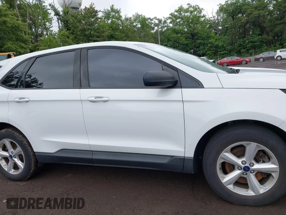2015 Ford Edge SE z VIN 2FMTK4G87FBC18076, wystawiony jako IAAI lot #42536718 z przebiegiem 180 790 mil mil oraz . Historia ofert i sprzedaży dostępna na DreamBid. Obrazek 13.