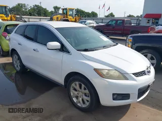 2007 Mazda CX-7 Sport z VIN JM3ER293470140848, wystawiony jako IAAI lot #42401221 z przebiegiem 184 648 mil mil oraz . Historia ofert i sprzedaży dostępna na DreamBid. Obrazek 1.