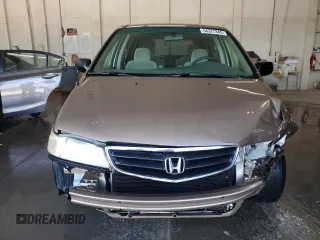 2004 Honda Odyssey LX z VIN 5FNRL18554B007005, wystawiony jako Copart lot #54377345 z przebiegiem 219 655 mil mil oraz Szkoda całkowita • Salvage title. Historia ofert i sprzedaży dostępna na DreamBid. Obrazek 5.