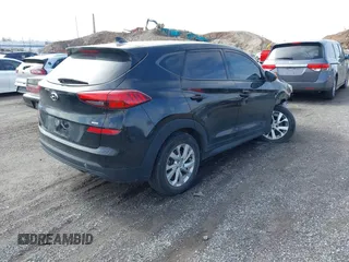 2019 Hyundai Tucson SE with VIN KM8J2CA46KU977863, listed as a IAAI auction lot 41704318 with 23,076 mi miles. Bid and sale history available at carsss.com. Image 4.