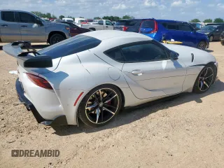 2021 Toyota Supra 3.0 with VIN WZ1DB0C05MW034477, listed as a Copart auction lot 61302525 with 80,962 mi miles and Salvage title. Bid and sale history available at DreamBid. Image 3.