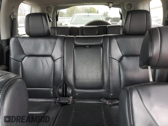 2013 Honda Pilot Touring with VIN 5FNYF3H99DB007204, listed as a Copart auction lot 56891095 with 151,709 mi miles and Salvage title. Bid and sale history available at DreamBid. Image 10.