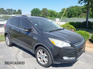 2013 Ford Escape SEL with VIN 1FMCU0HX8DUB38480, listed as a IAAI auction lot 42176271 with 154,309 mi miles. Bid and sale history available at carsss.com. Image 1.